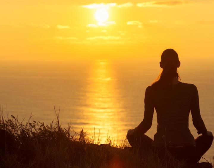 Meditation at sunset with sea view healing power of nature
